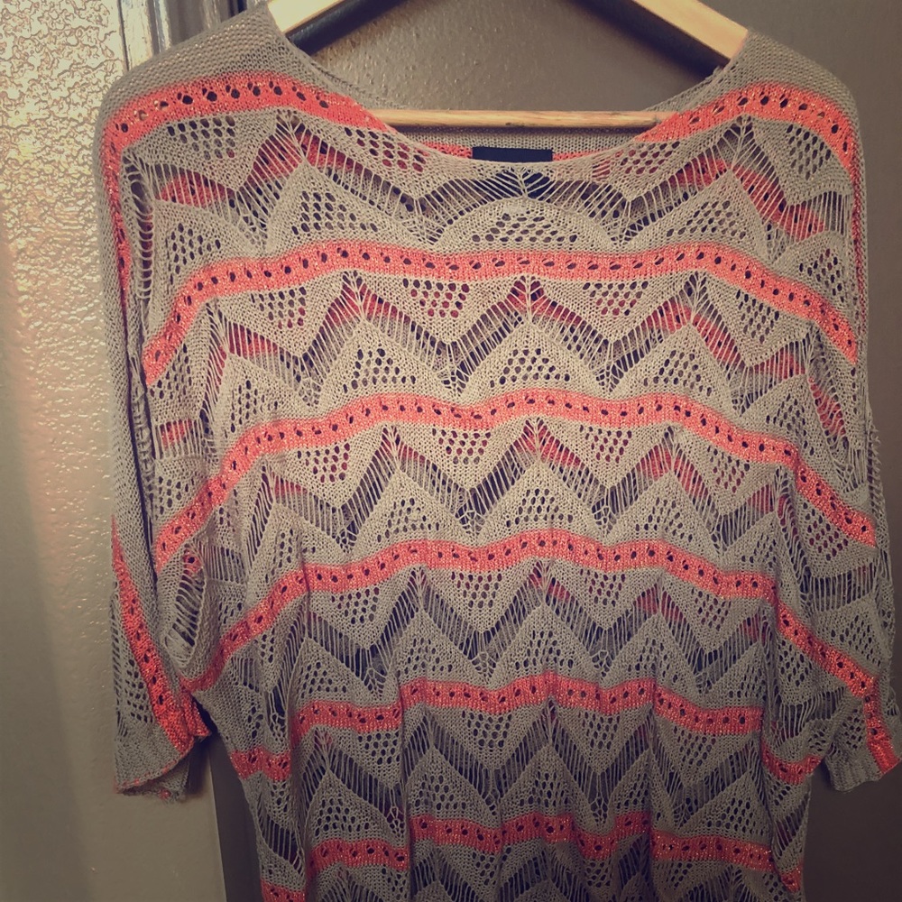 Woman’s mesh sweater. Beige, gold and orange.